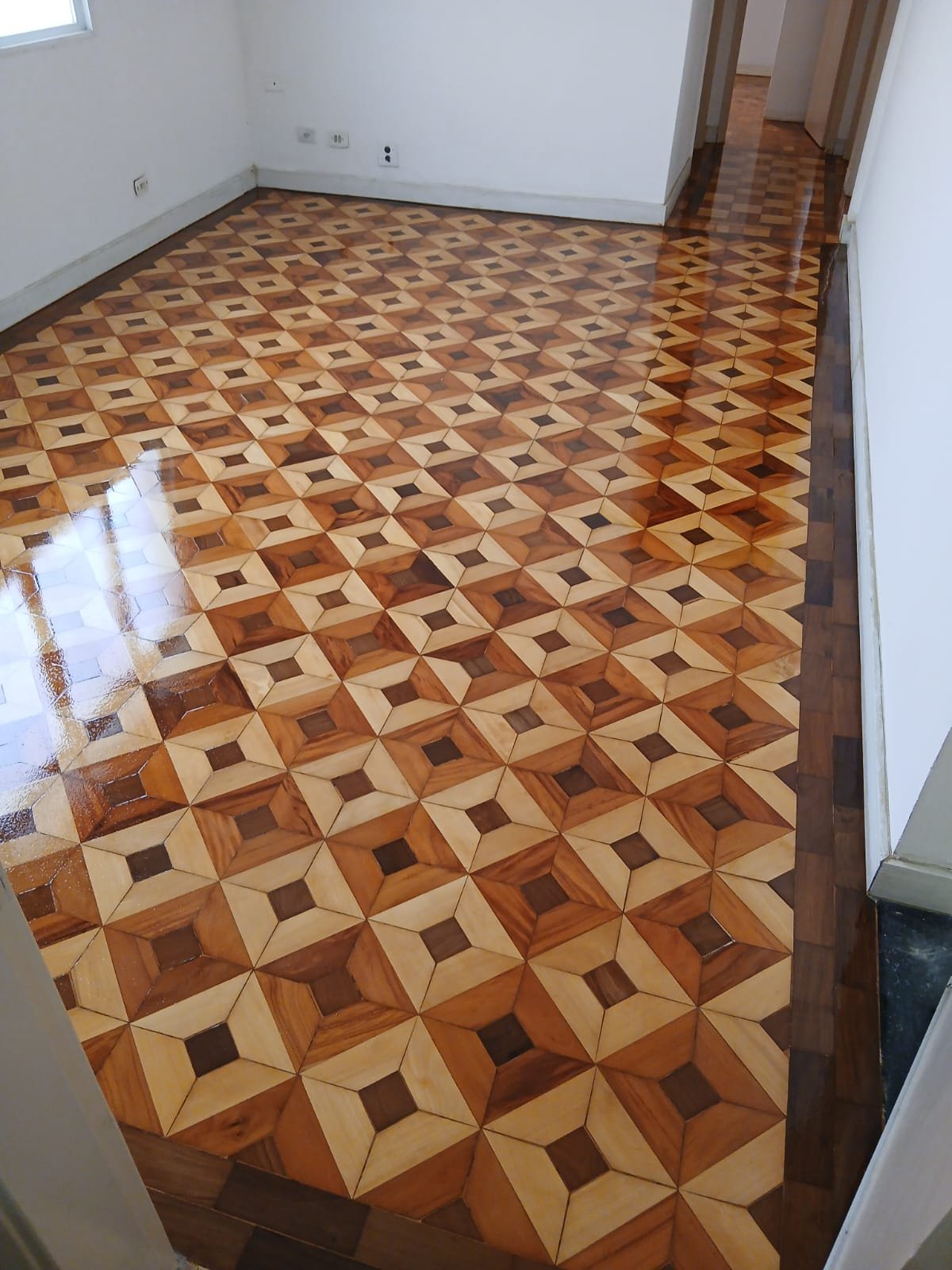 Depois: Restauração de Piso de Madeira
